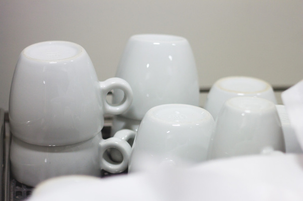 Кавові чашки на сушарці
 - Фото, зображення