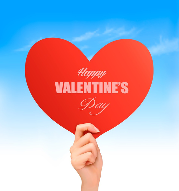 Holiday valentine background with hand holding red heart. Vector - Vektori, kuva