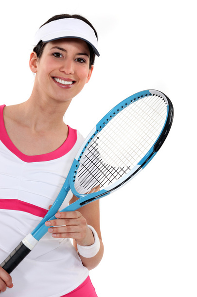 Woman playing tennis - Fotó, kép
