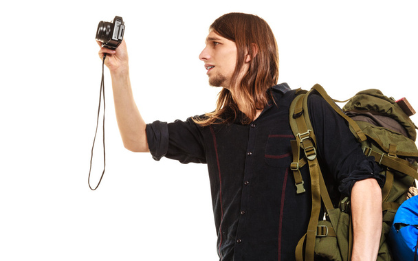 tourist  taking photo with camera. - Zdjęcie, obraz