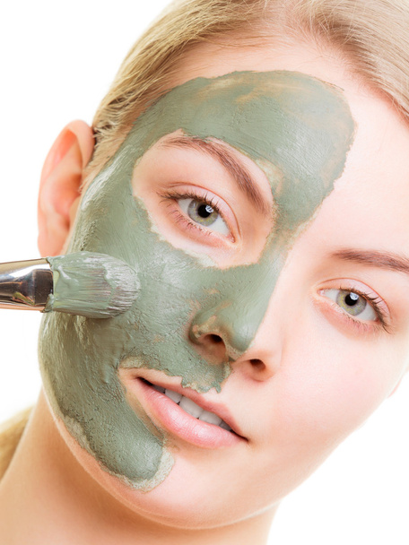 Woman applying clay mud mask - Foto, immagini