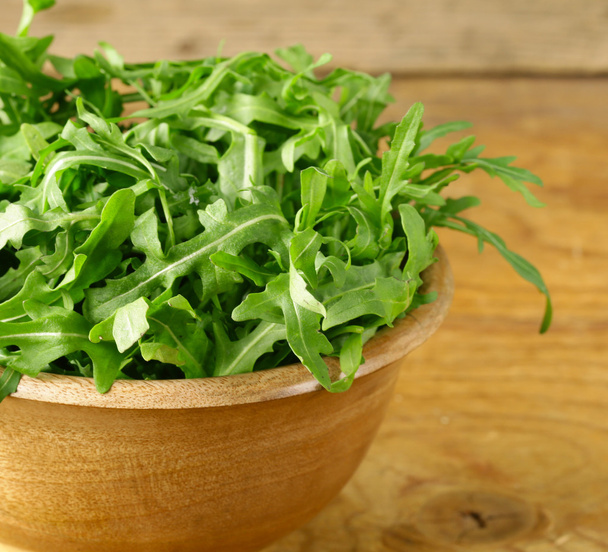 bowl of fresh green, natural salad arugula - Foto, immagini