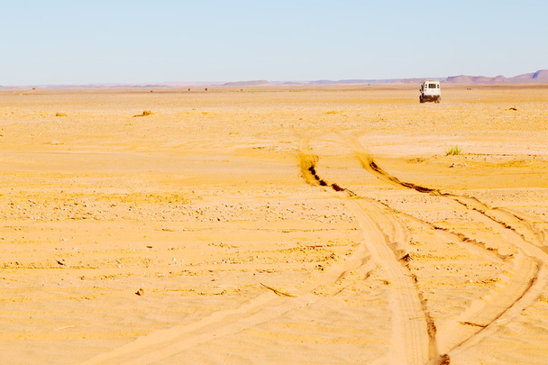 сонячне світло в пустелі марокканського піску і дюни
 - Фото, зображення