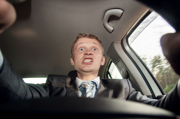 Angry driver on the road driving a car - Foto, Imagen