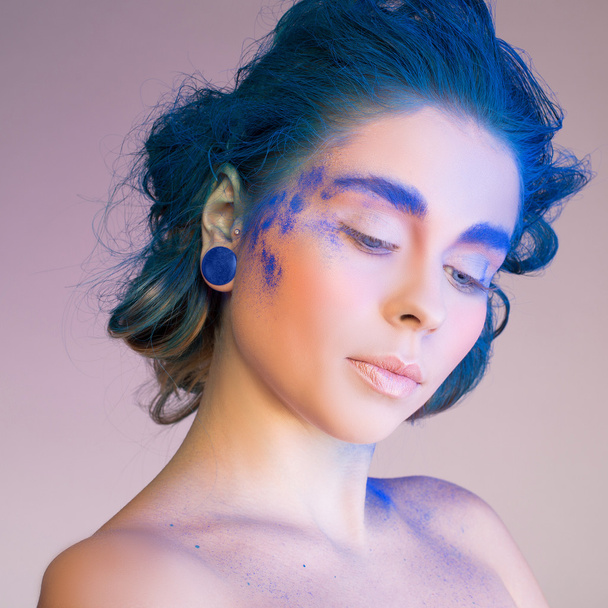 Portrait of beautiful young woman with creative pop art makeup - Fotó, kép