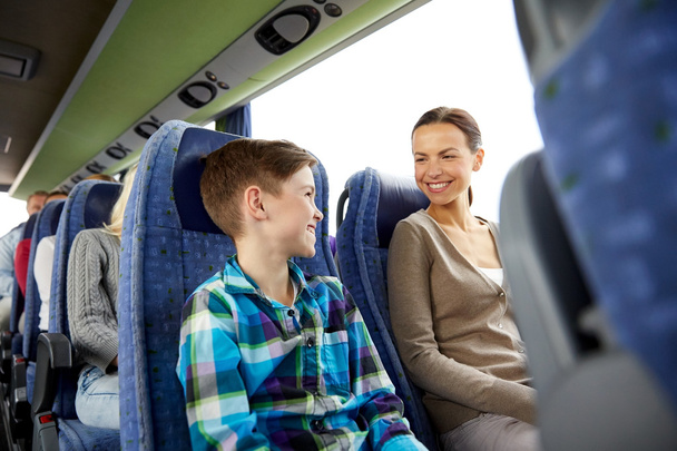 happy family riding in travel bus - Foto, Imagen