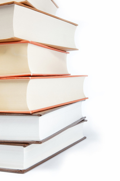A stack of books on a white background. - 写真・画像