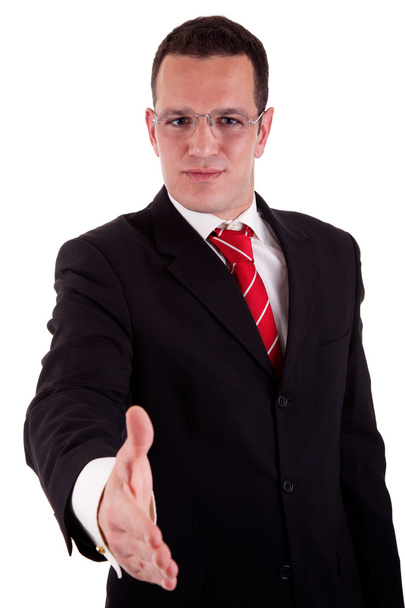 hombre de negocios guapo, con el brazo extendido para un apretón de manos, aislado en blanco, plano de estudio
 - Foto, Imagen