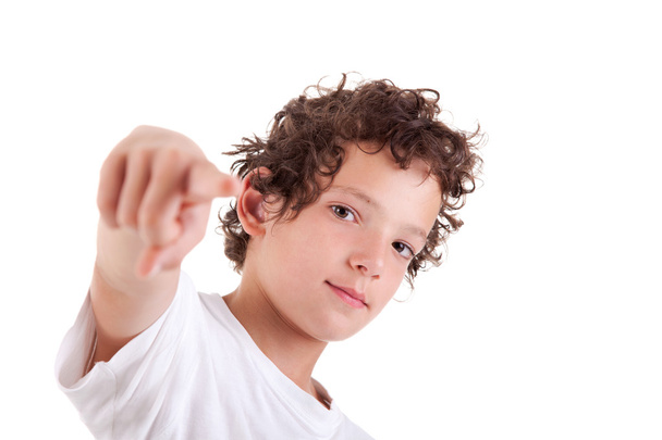 Cute Boy pointing, isolated on white, studio shot - Photo, Image