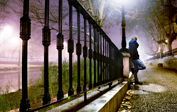 night cityscape and lonely man - Foto, imagen