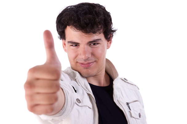 Молодий чоловік посміхається, з великим пальцем вгору, ізольований на білому, студійний знімок
 - Фото, зображення