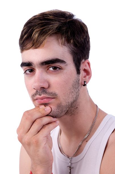 Portrait of a handsome young man thinking, on white background. Studio shot - Foto, afbeelding