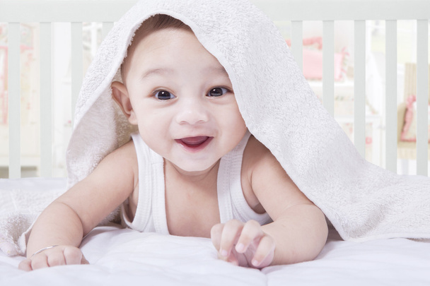 Cute Baby Try to Crawl under A Towel - Fotoğraf, Görsel
