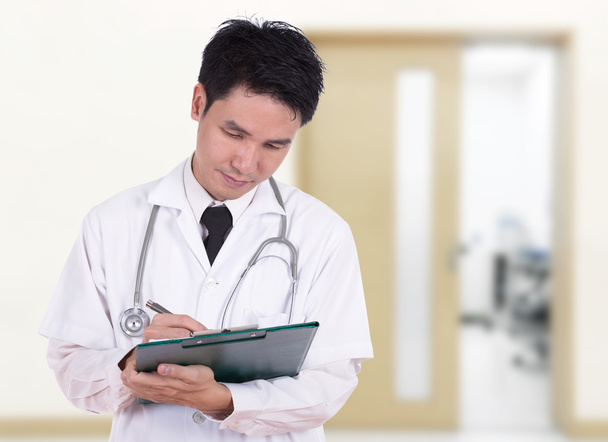 doctor writting medical report - Foto, Imagem