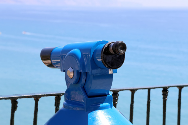Telescope viewer overlooking from Balcon de Europa in Nerja, Andalusia, Spain. It is on the country southern Mediterranean coast, about 50 km east of Malaga - Fotografie, Obrázek
