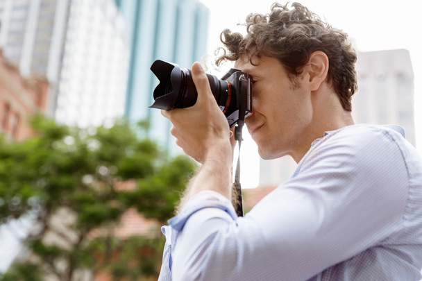 Male photographer taking picture - Zdjęcie, obraz