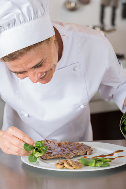 Chef finishing your plate - Photo, Image