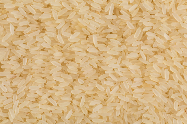 Uncooked rice background - Fotoğraf, Görsel
