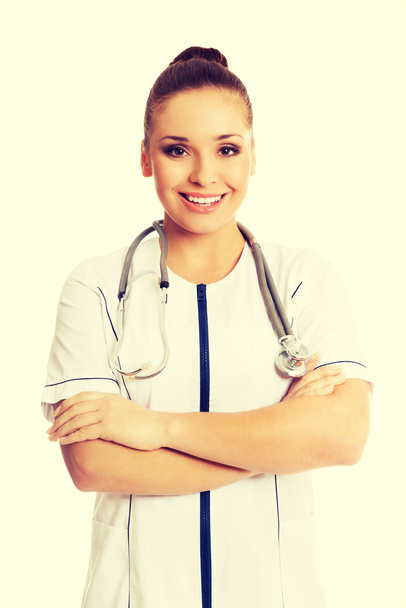Female doctor with folded arms - Фото, зображення