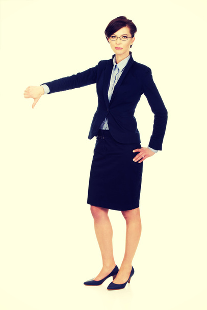 Business woman showing thumbs down. - Foto, Bild