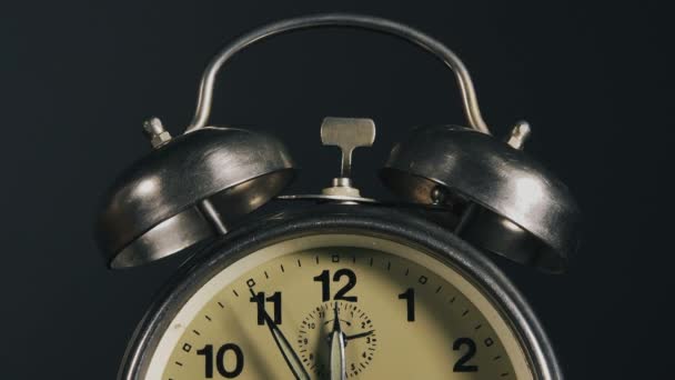 Vintage alarm clock midnight time lapse footage - Materiał filmowy, wideo