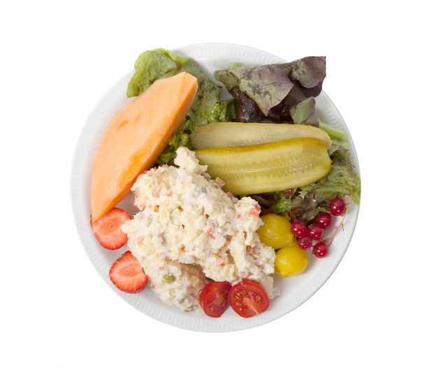 Snack time - View of Russian salad on a white plate - Photo, Image