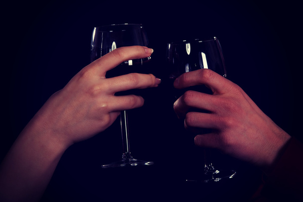 Couple with wine by a table. - Foto, Imagem