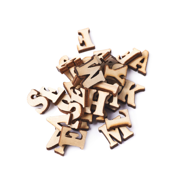 Pile of wooden letters isolated - Foto, afbeelding