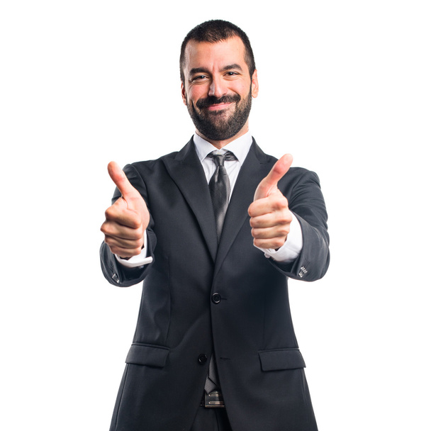 Businessman with thumb up - Foto, afbeelding