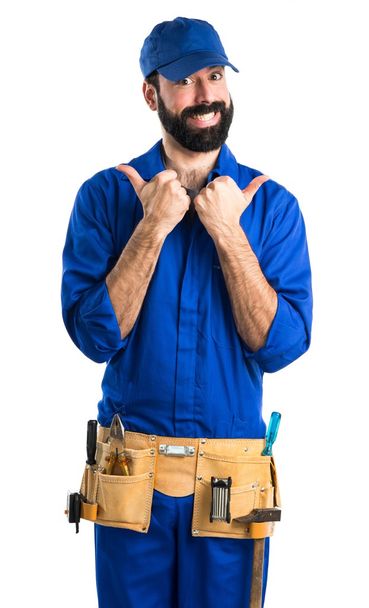 Plumber with thumb up - Foto, afbeelding