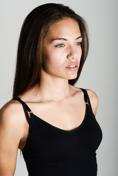 Beautiful young woman without make-up on white background - Photo, Image