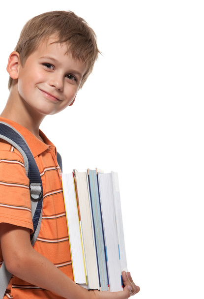 Boy holding books - Valokuva, kuva