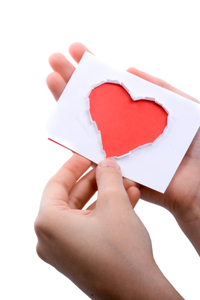 Carta a forma di cuore rosso in mano
 - Foto, immagini