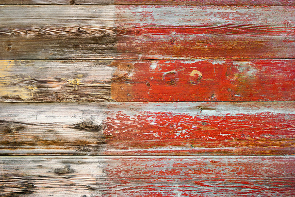 Weathered plank half painted in red color - Fotografie, Obrázek