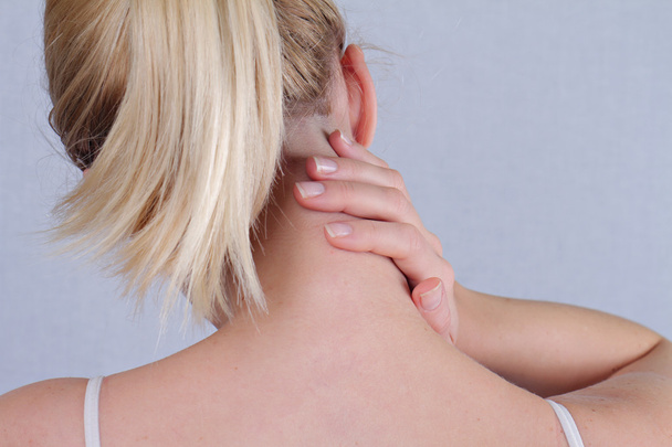 Woman with neck pain close up. Pain relief concept - Fotografie, Obrázek