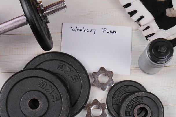 Fitness background. Workout plan, dumbbells. Copy space image - 写真・画像