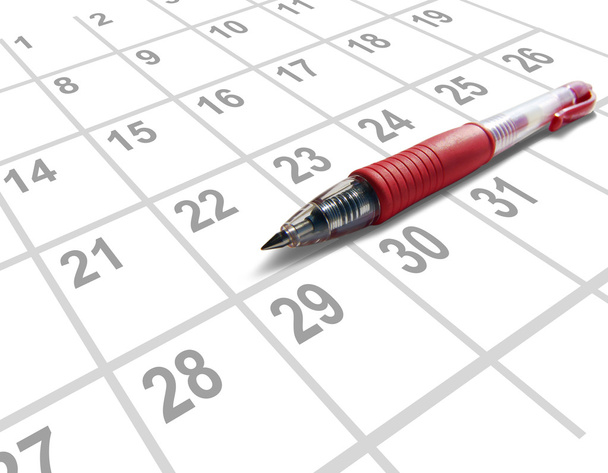 roter Stift auf einem Kalender - Foto, Bild