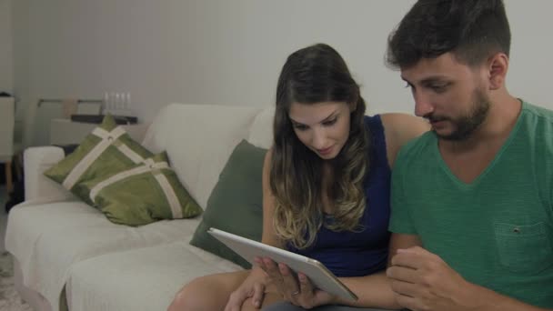 pair watch videos on the tablet - Video, Çekim