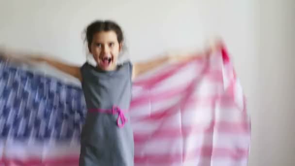 teen girl shouting holding American flag usa - Felvétel, videó