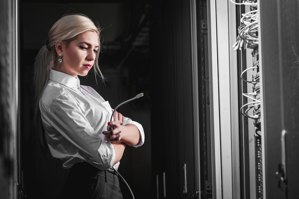 Young engineer businesswoman in server room - Foto, Imagem