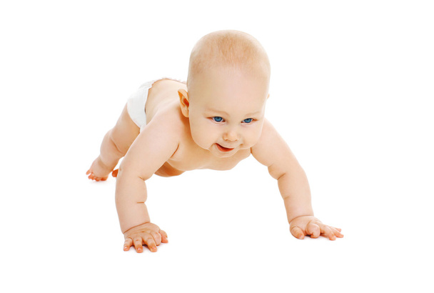 Cute little baby in diapers crawls on a white background - Photo, Image