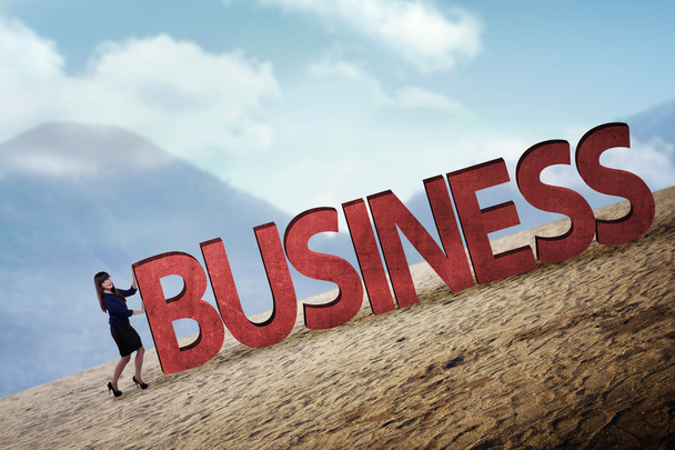 上り坂ビジネス単語を押して実業家 - 写真・画像