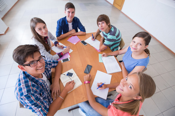 students sitting at desk - Фото, зображення