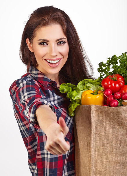 woman with vegetables in bag - Foto, Imagen