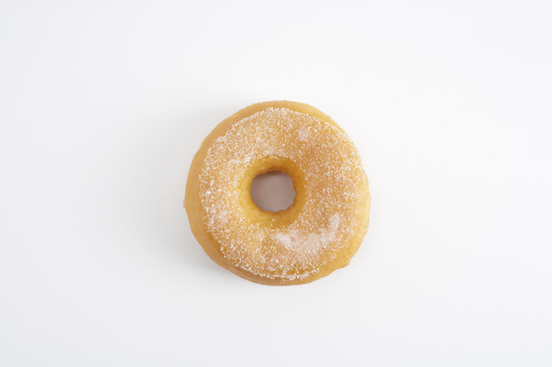 donut with sugar on top, top view on white background - Photo, Image