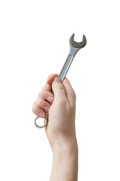 Caucasians man's hand holds spanner or wrench. Maintenance conce - Foto, Bild