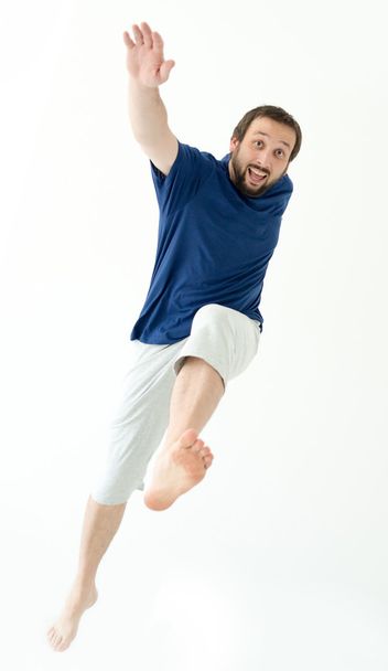 Man jumping and making gestures and expressions - 写真・画像