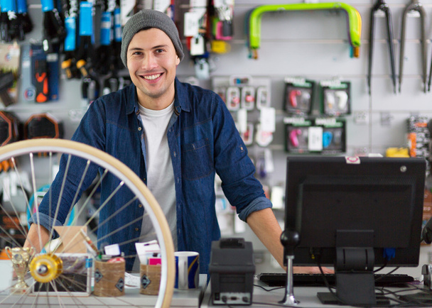 Salesman in bicycle shop - Photo, Image