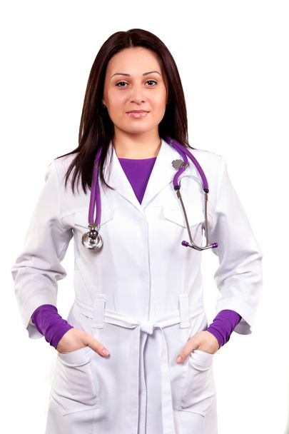 sevecen bir doktor veya sağlık işçisi beyaz üniforma ile - Fotoğraf, Görsel