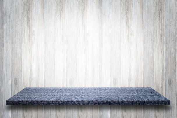 Empty top view of blue jeans table on wood background, For displ - Φωτογραφία, εικόνα